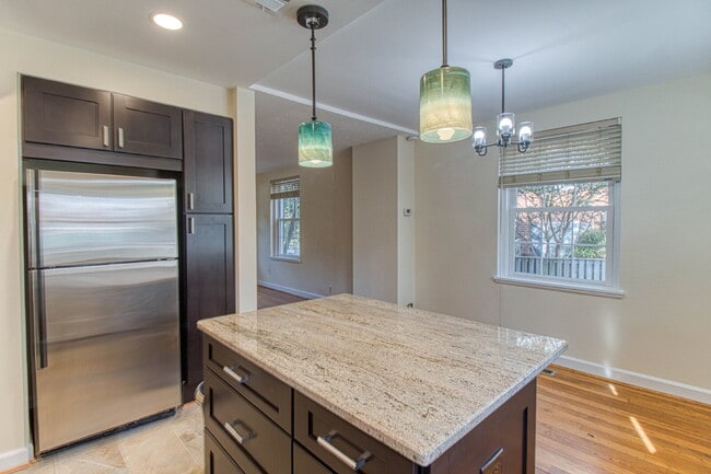 Building Photo - Discover Exceptional Townhouse Living!