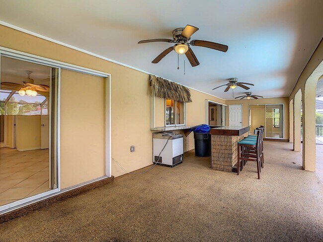 Building Photo - Port Charlotte Waterfront Pool Home - Grea...