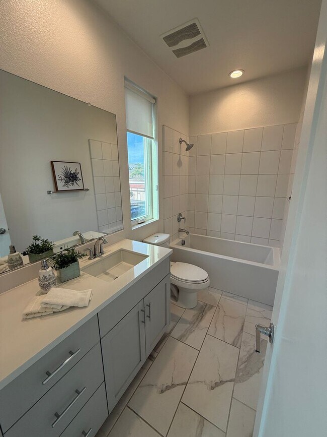 Building Photo - Newer Central Dublin Townhome with 2-Car Garage and Private Rooftop Deck