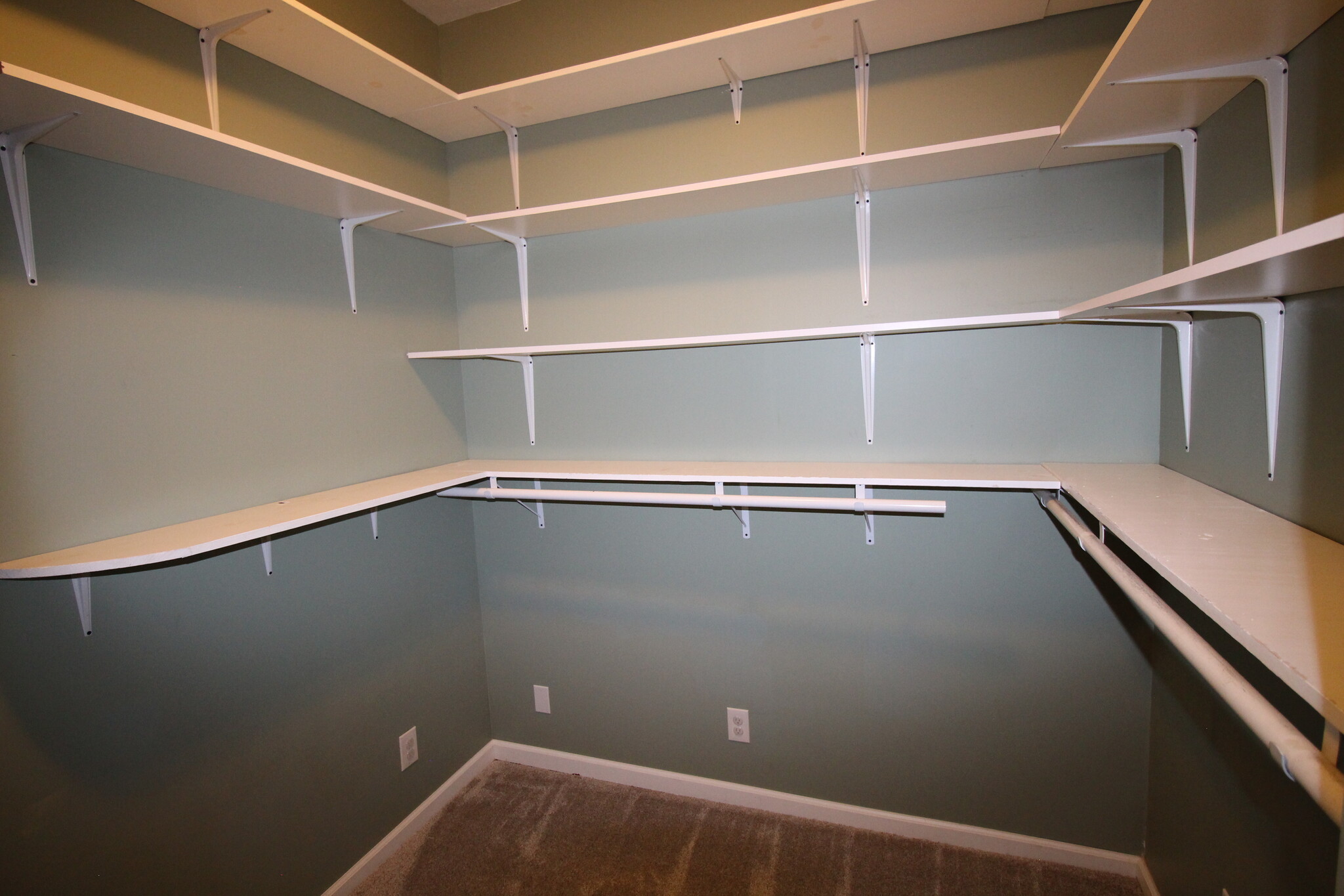 Huge walk-in master closet with rods, shelving and hooks - 4536 Leo Street