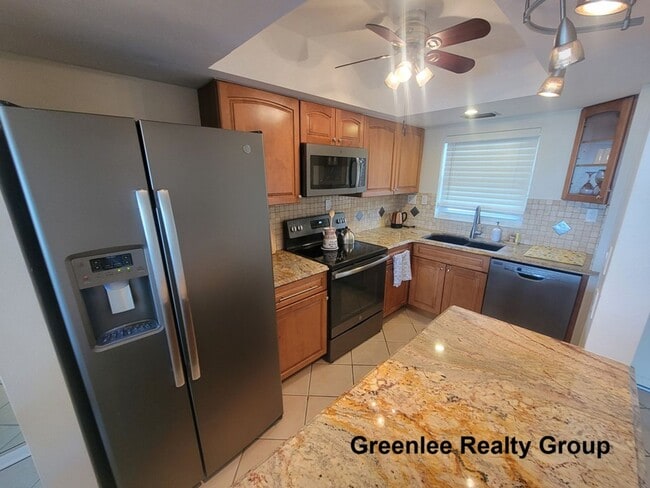Building Photo - Waterfront Living & Maintenance Free Living at Its Finest – With Views You’ll Never Get Tired Of!