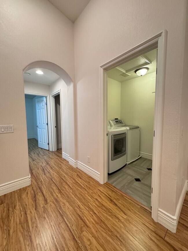 Building Photo - LUXURY LIVING • GOLF COURSE VIEW • GUARD-GATED COMMUNITY