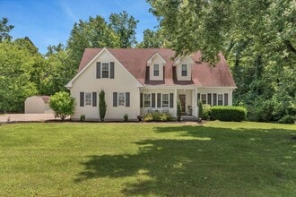 Building Photo - One acre lot with first floor suite in bea...