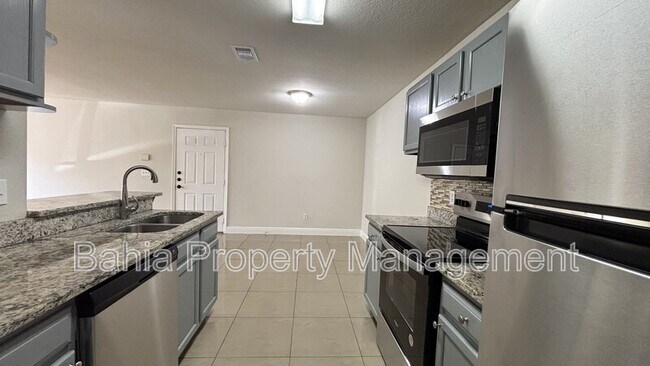 Building Photo - 8849 Latrec Ave