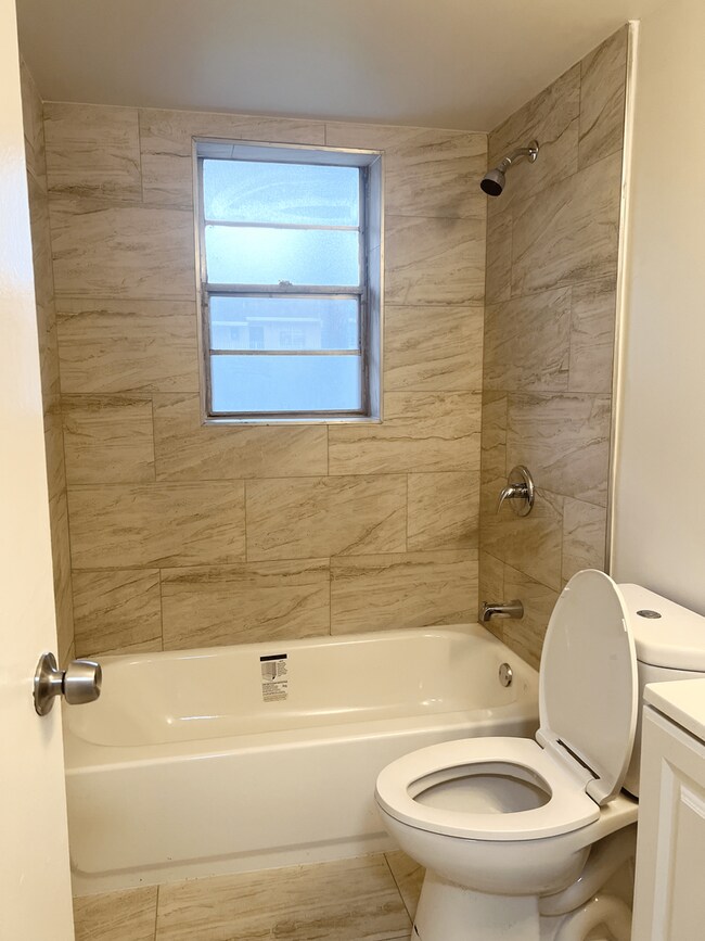 Building Photo - LARGE NEWLY RENOVATED 2 BEDROOM APARTMENTS + OFFICE Application fee is waived during move in