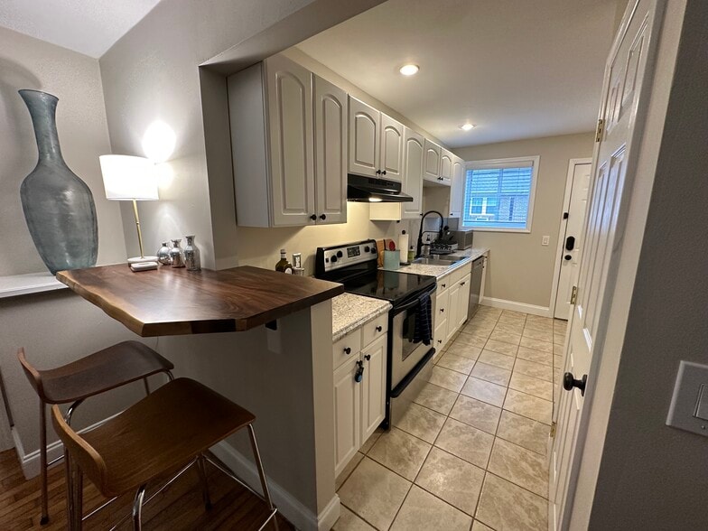 Kitchen with stainless steel appliances - 603 Maplewood Ave