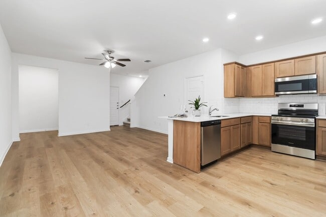 Building Photo - Brand-New 2-Story Townhome with Private Yard & 2-Car Garage