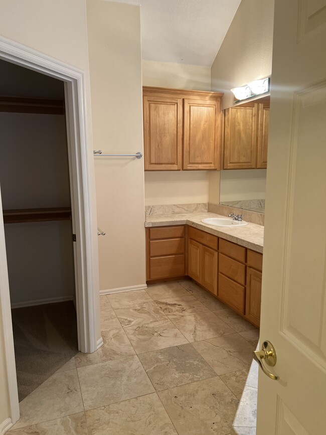 master bath and closet - 3921 NW Banff Dr