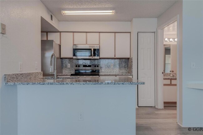 Building Photo - 2210 Grand Cayman Ct