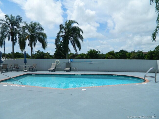 Building Photo - 6734 N Pine Island Rd