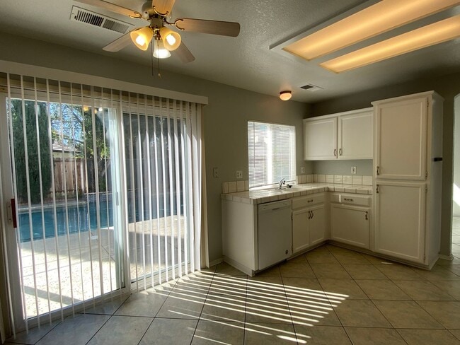 Building Photo - Large Four Bed, Three Bath Home with a Pool
