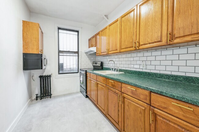 Building Photo - 6705 Woodside Ave