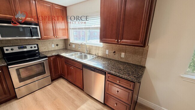 Building Photo - Remodeled Santa Clara Condo | 3BR/2BA + 2 Parking – OFFERED BY PROPERTY FORCE, INC.