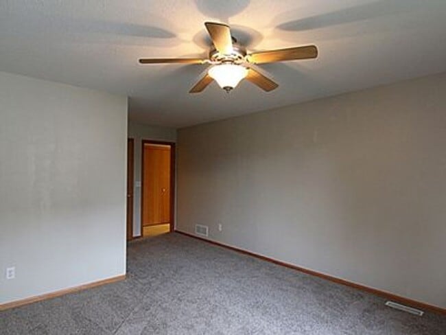 Building Photo - Great NE location -  4 bedroom 2.5 bath with attached 2 stall garage. Close to shopping & restaur...