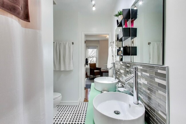 Building Photo - COMING SOON - Sprawling 5 Bed, 3 Bath, Two Kitchens, Dual Back Decks, Two Office/Den Townhouse, 2...