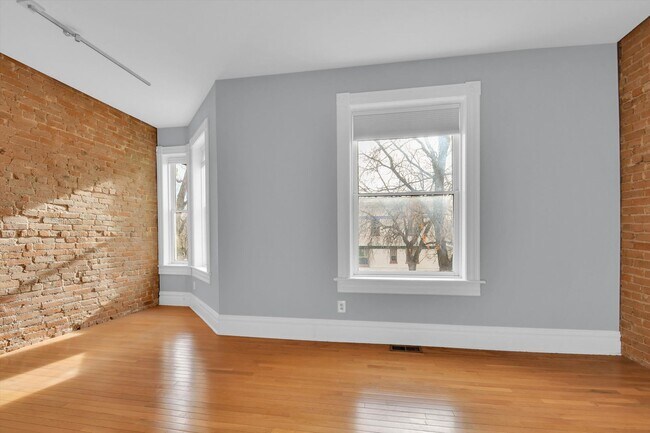 Building Photo - Architecturally Stunning Curtis Park Townhome With Historic Charm