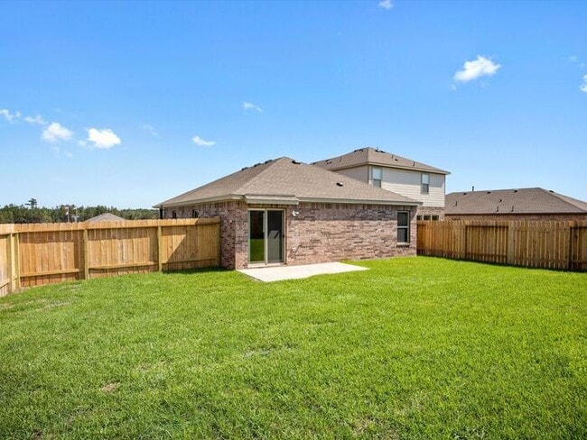 Building Photo - Now Available! Spacious 3-Bedroom, 2-Bath Home with a Privacy-Fenced Backyard in Magnolia Springs