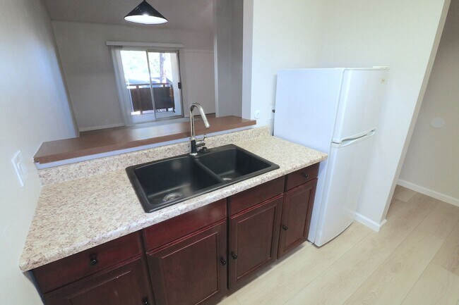 Building Photo - 3rd floor studio in Mission Valley! Beautiful vinyl flooring throughout/ 1 Prkg Space/ Mission Va...