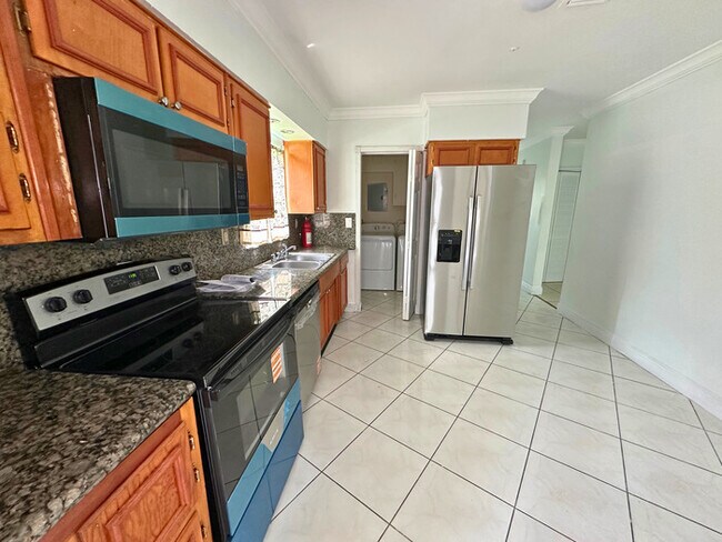 Building Photo - A charming home features 3 spacious bedroo...