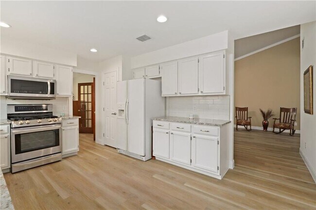 Building Photo - 4-bedroom, 1-story home with dedicated office space and large backyard!