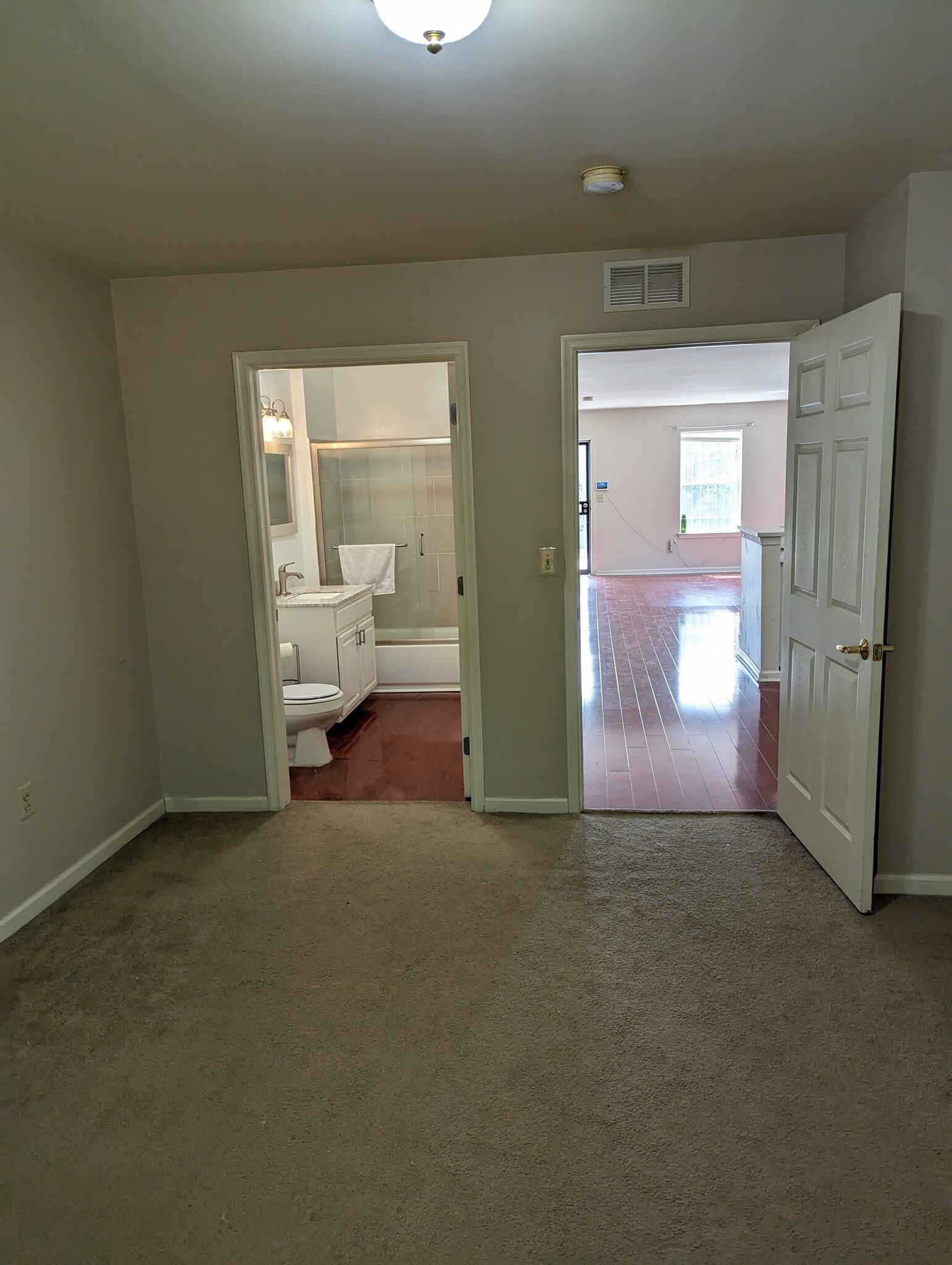 Downstairs bedroom (looking at attached bathroom and living room) - 631 N 44th St