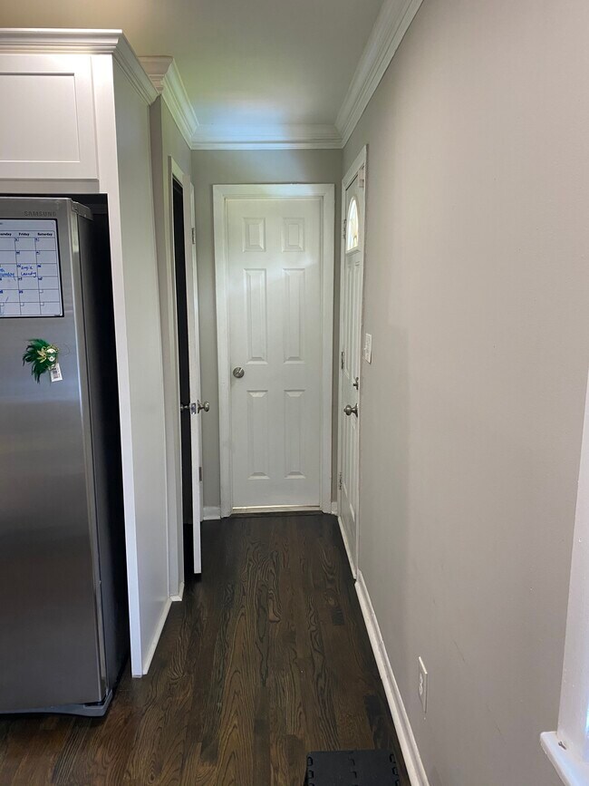 Hallway in kitchen leading to bathroom and backdoor - 1985 Thomasville Dr SE