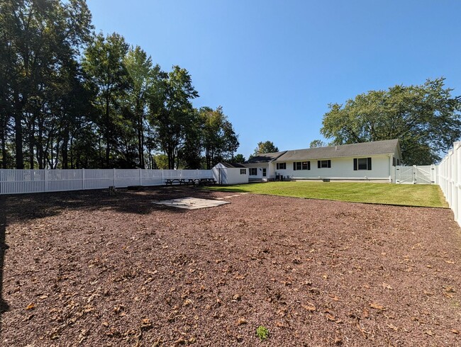 Building Photo - Welcome Home to Harrington: 3-Bedroom Oasi...