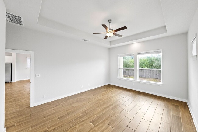 Building Photo - Greenbelt. 3 Car Garage. Built In Dog Room.