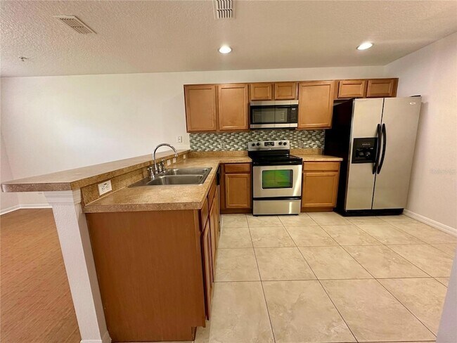 Building Photo - 13511 Tea Rose Way