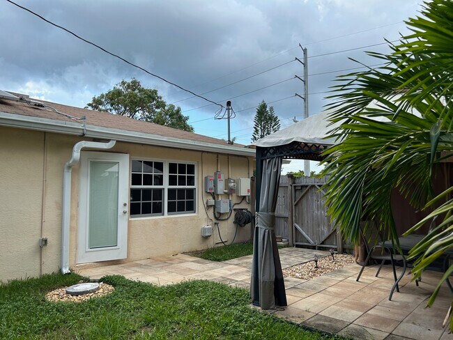 door from kitchen to outside gazabo - 1473 NE 48th St