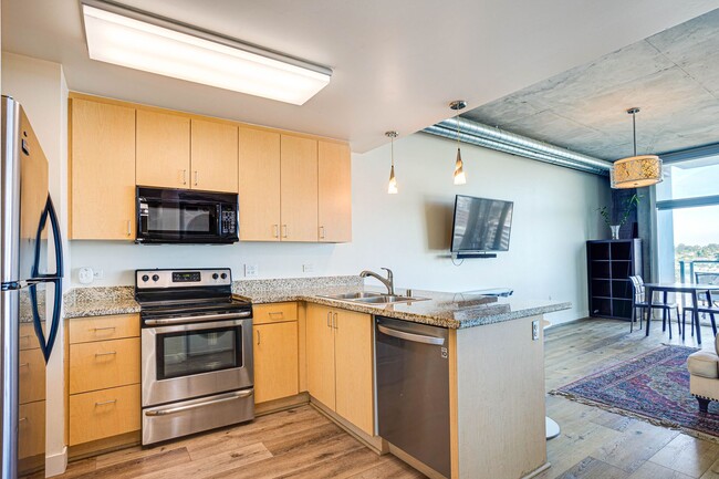 Building Photo - Stunning 16th-Floor Smart Corner Loft with...