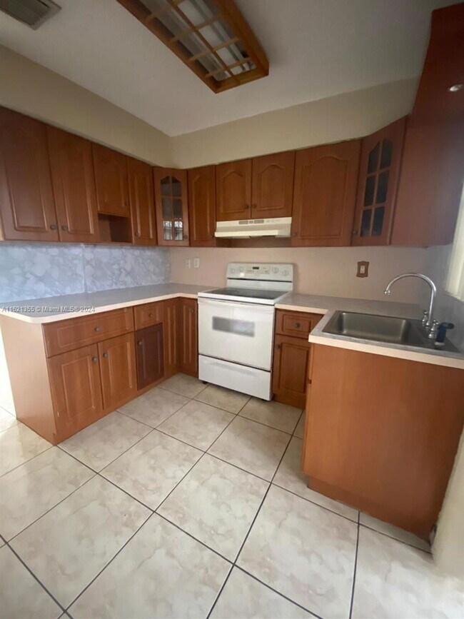 Building Photo - 4100 W 14th Ave