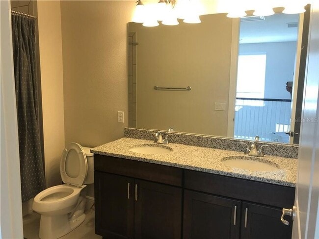 Building Photo - 8896 Bismarck Palm Dr