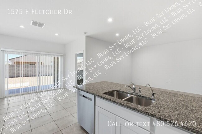 Building Photo - 1575 E Fletcher Dr