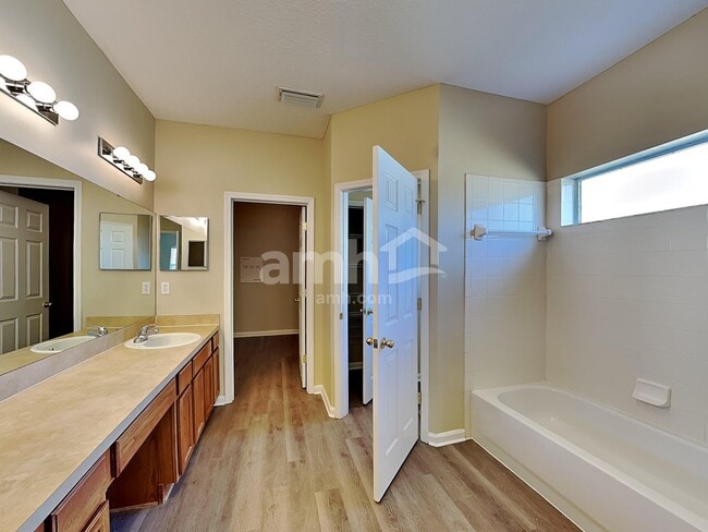 Building Photo - 7117 Rapid River Dr W