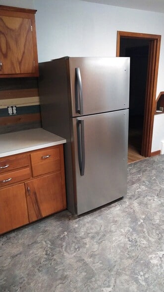 SS refrigerator, new backsplash - 515 3rd Ave NW