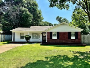 Building Photo - Spacious 4BR/2BA Southaven Home | 1,899 Sq Ft, Hardwood Floors, Brick Fireplace & Patio