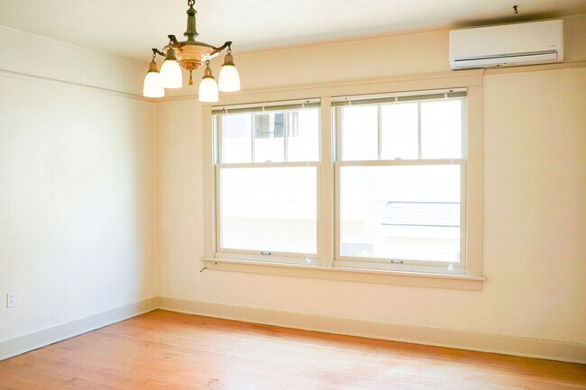 Building Photo - Charming Buckman Studio: Hardwoods, Walk-in Closet & More!