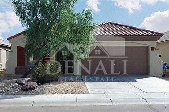 Building Photo - 9237 W Milkweed Loop