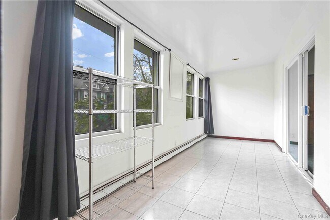 Building Photo - 84-39 Lefferts Blvd