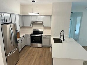 Building Photo - Resort Style Living @ Barrington Park Condos! Renovated Ground Floor 3/2 with Garage!