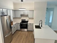 Building Photo - Resort Style Living @ Barrington Park Condos! Renovated Ground Floor 3/2 l!