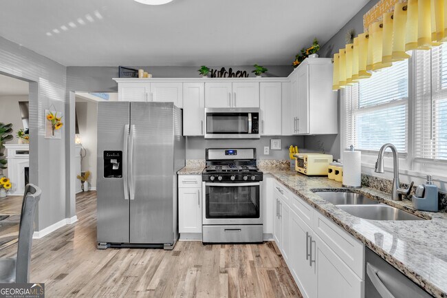 Building Photo - 6575 Hidden Brook Trail