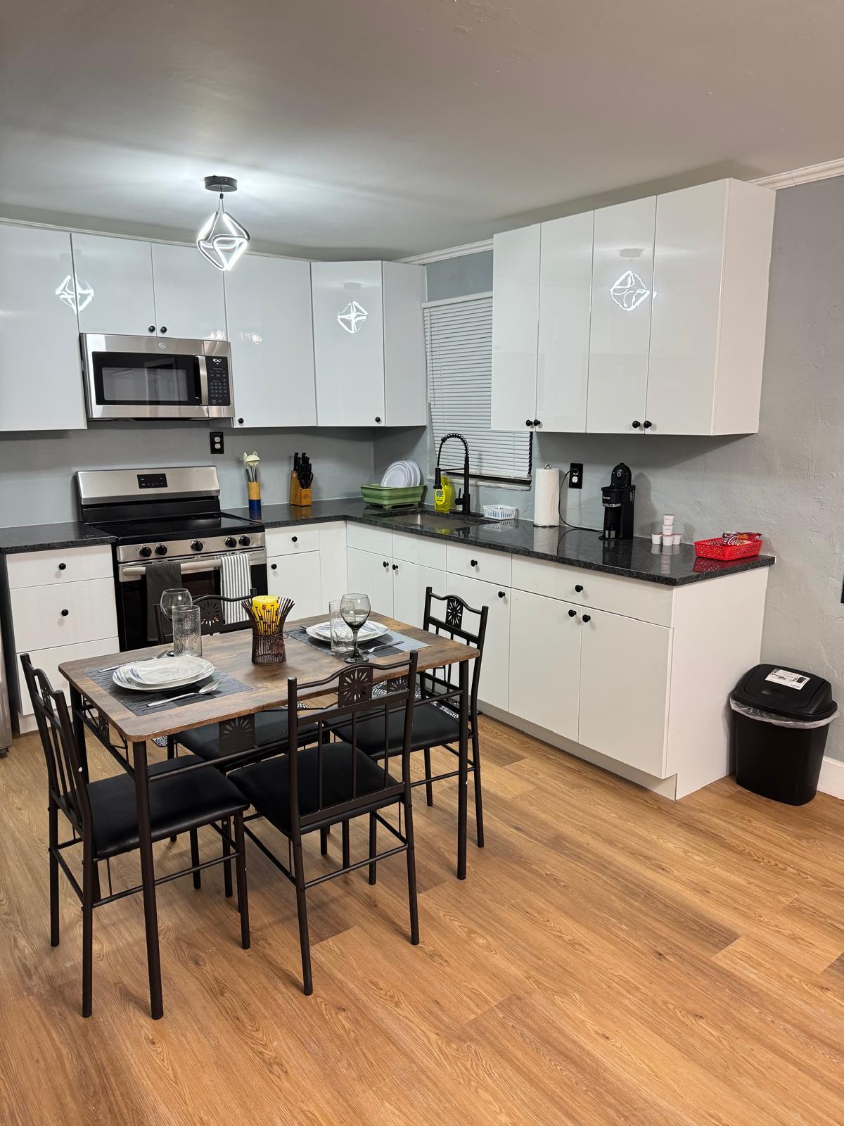 Open concept kitchen dining - 414 N 60th Way