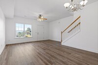Building Photo - 3-bedroom 2-bathroom townhome now availabl...