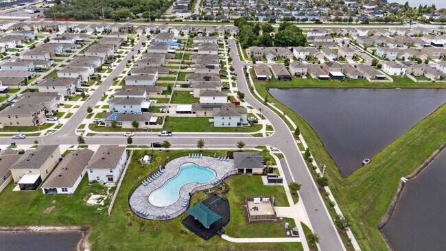 Building Photo - "Spacious 5-Bedroom Haven with Stunning Lake Views & Granite Elegance in Riverview!"