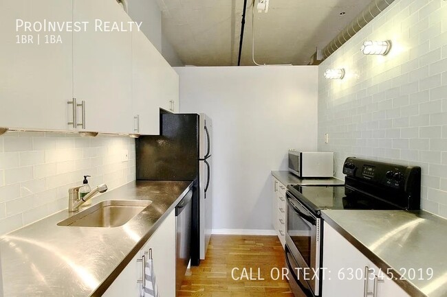 Building Photo - Available Now! Sprawling Sun-drenched 1Bed...