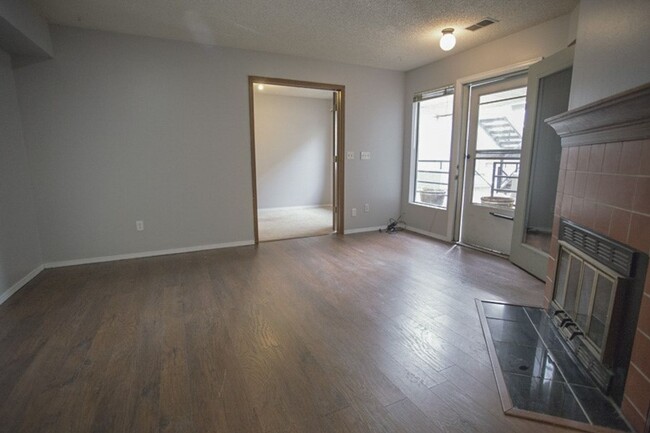 Building Photo - NICE 2-BDRM CONDO WITH FIREPLACE, GARAGE, ...