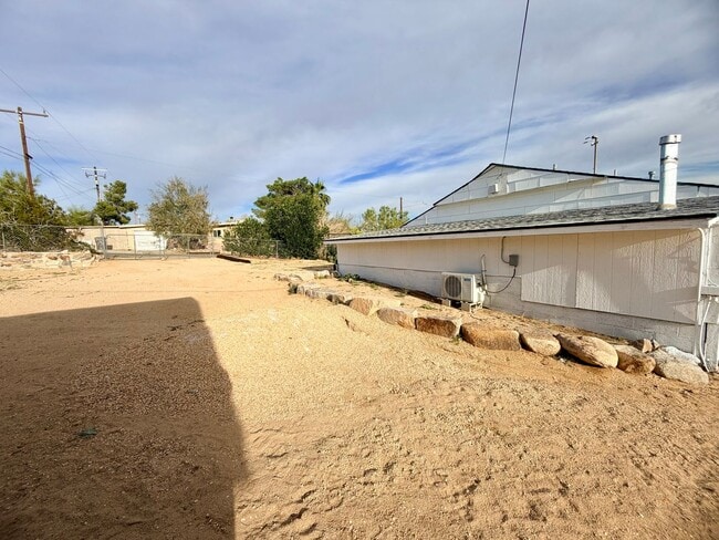 Building Photo - Modern 3-Bedroom Desert Bungalow with Stunning Views – Unfurnished - Price reflects MOVE IN SPECI...