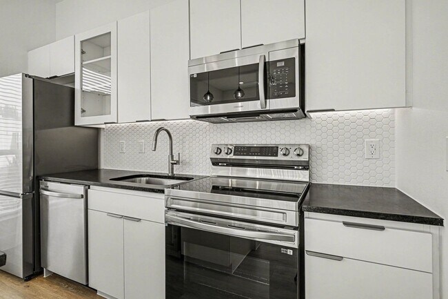 Building Photo - Be the first to live in Unit 205 at 2217 Fitzhugh—a brand-new 2026 construction offering 597 sq f...